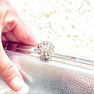 Elegant Silver Clutch with Rhinestone Button Clasp 👛